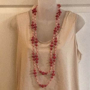 Bead for Life extra long pink paper bead necklace.